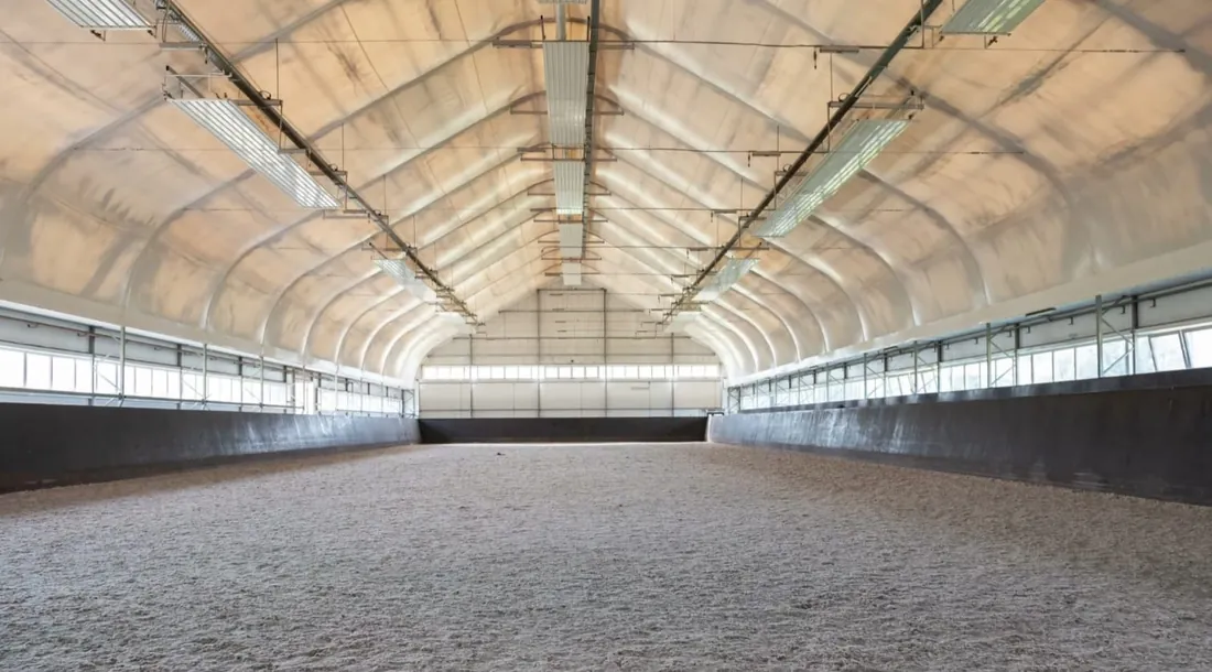 An empty indoor arena ready for work